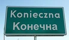 znak drogowy w dwóch językach